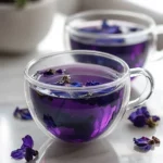 Brazilian Mounjaro Recipe – The Best 4-Ingredient Detox Drink 4 Brazilian Mounjaro recipe with butterfly pea flowers