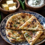 Stuffed Kulcha Recipe – The Best 9-Step Homemade Guide 5 freshly cooked stuffed kulcha with ghee and chutney