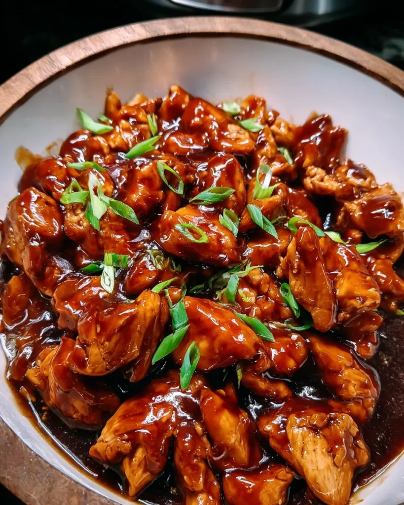 Bourbon Chicken Crock Pot 4 codinofouad httpss.mj .runVeIddKswAXQ realistic Close up amate 02ef3ef5 5971 4ded 9aa5 5b7e390d234e 3