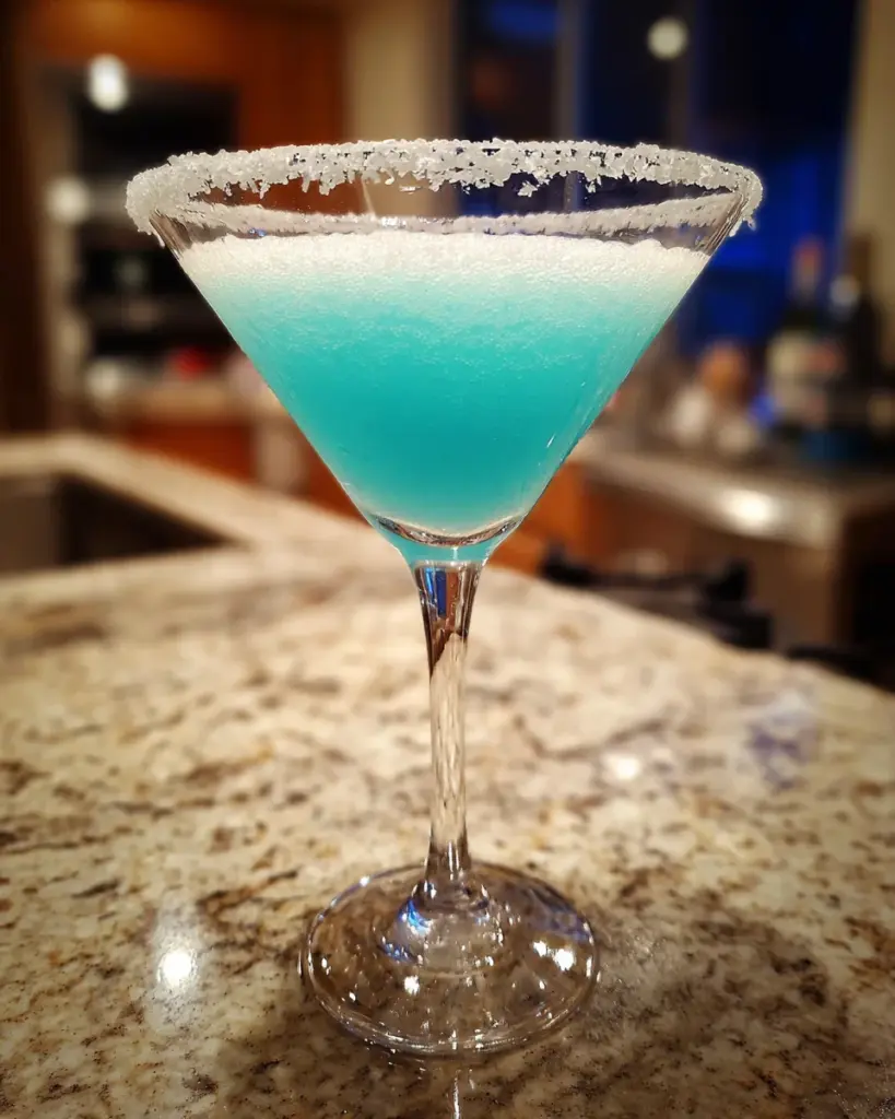 Snowflake Martini: A Cool, Creamy, and Beautifully Blue Winter Cocktail 4 codinofouad realistic Close up amateur photo from reddit. of ab239815 5c63 47e6 a451 f7417f2b9199 2